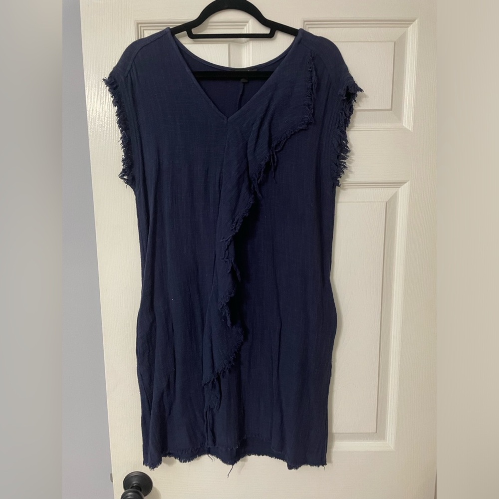 Navy dress with ruffle detailing down the front